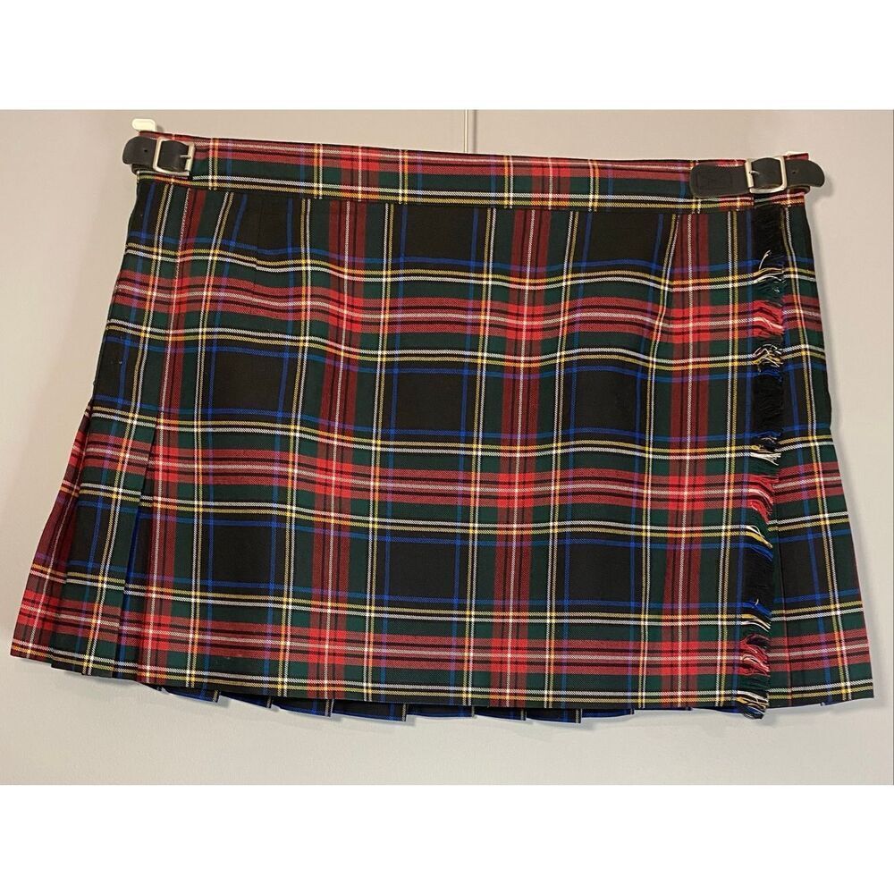 Size 16/18 tartan kilt.  Adjustable leather hardware from 19 1/2-20 1/2 inches.